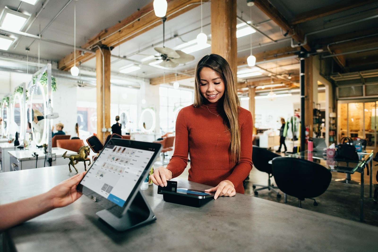 Customer smiling at checkout