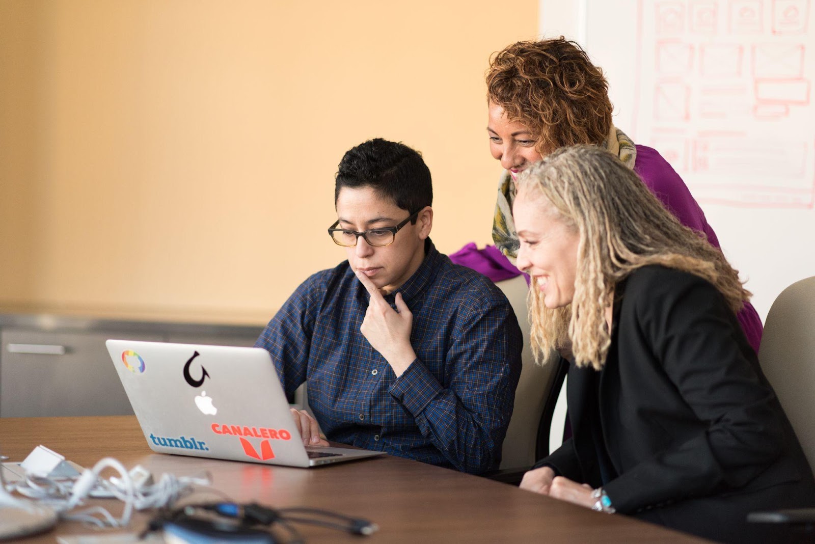 three nonprofit employees working together