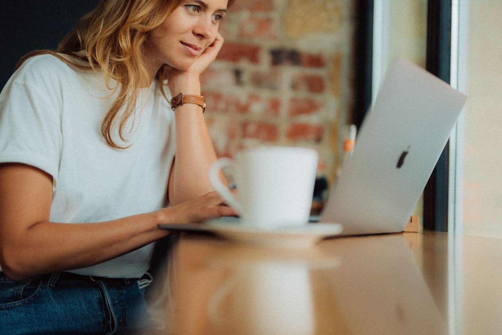 a woman working on a laptop